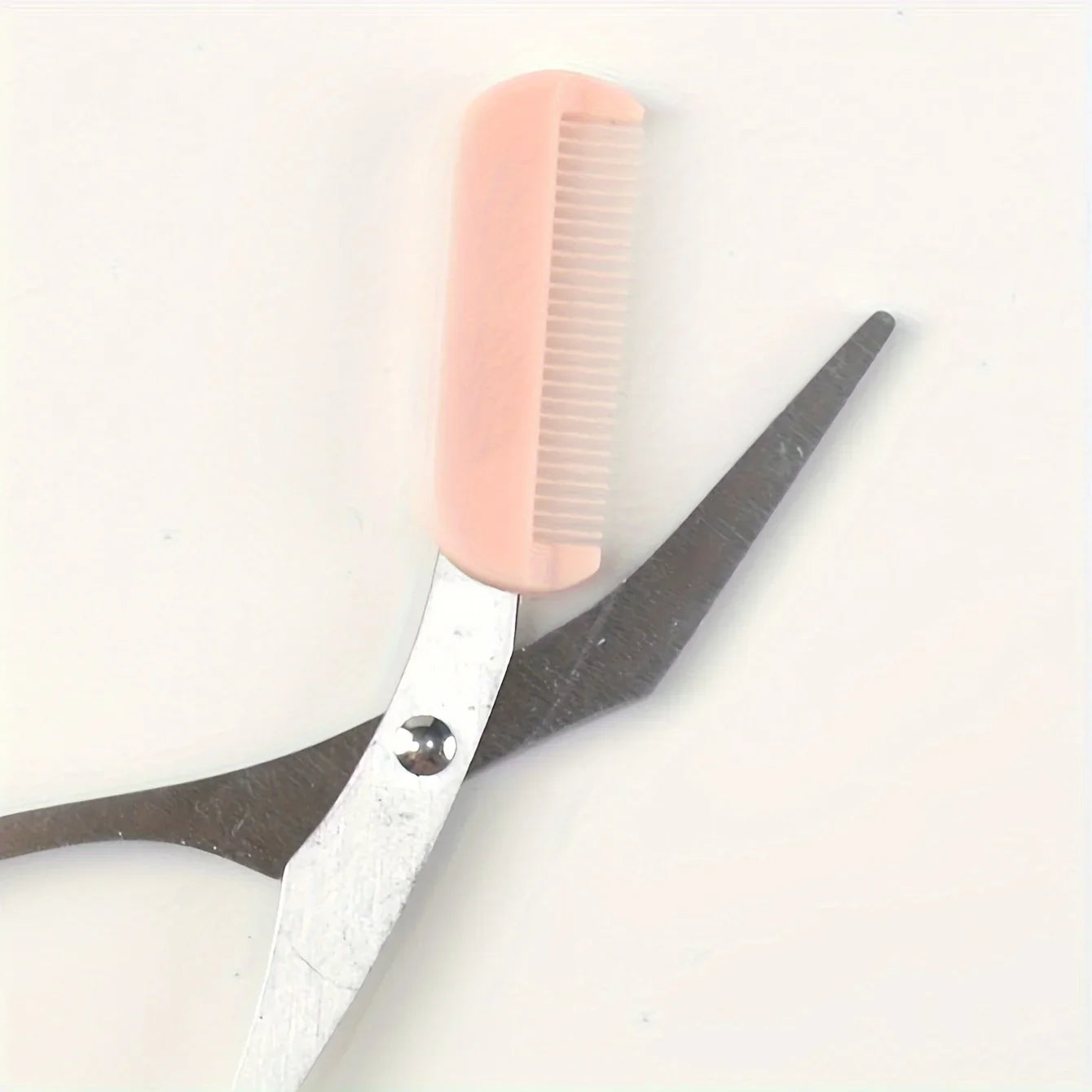 Pink eyebrow trimming scissors with built-in comb - stainless steel,